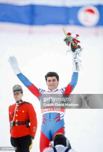 Alberto Tomba of Italy celebrates his gold medal performance in the Giant Slalom event of the Alpine Skiing Competition of the Winter Olympic Games...