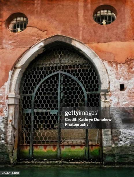 travel-old building in venice italy looks like a watchful face - venizia stock pictures, royalty-free photos & images