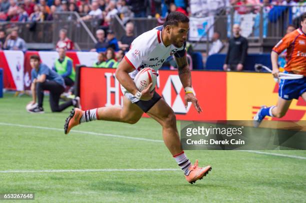 Martin Iosefo runs with the ball against South Africa during day 2 of the 2017 Canada Sevens Rugby Tournament on March 12, 2017 in Vancouver, British...