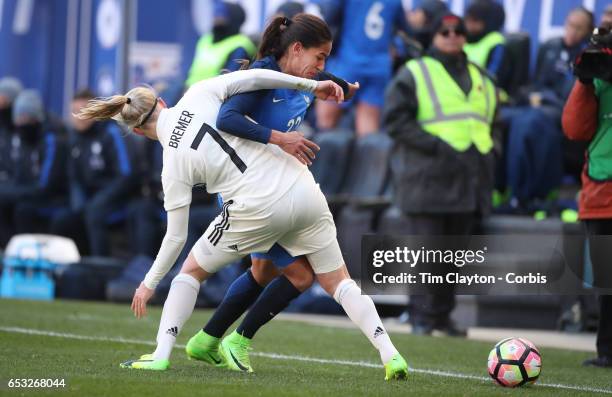 Amel Majri of France is challenged by Pauline Bremer of France during the France Vs Germany SheBelieves Cup International match at Red Bull Arena on...