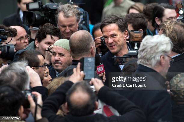 Dutch Prime Minister Mark Rutte speaks to the public and the media as he campaigns ahead of tomorrow's general election, on March 14, 2017 in The...