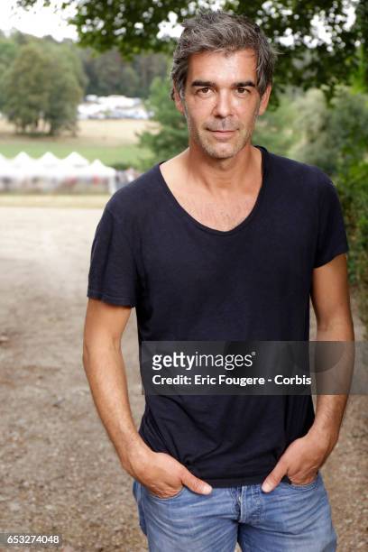Journalist Xavier De Moulins poses during a portrait session in Paris, France on .