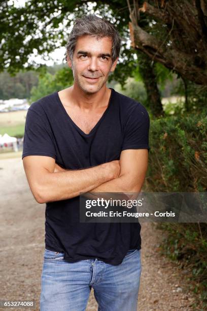 Journalist Xavier De Moulins poses during a portrait session in Paris, France on .