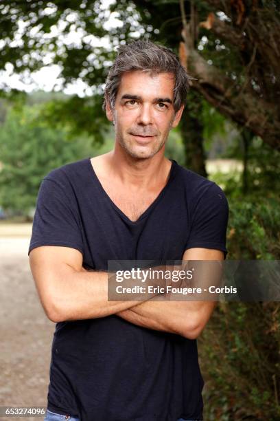 Journalist Xavier De Moulins poses during a portrait session in Paris, France on .