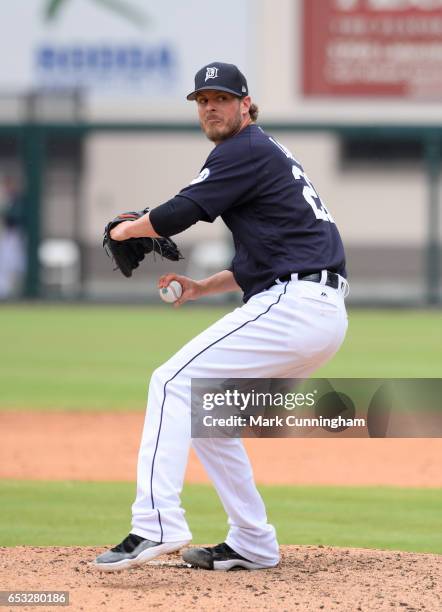 Mark Lowe of the Detroit Tigers pitches during the Spring Training game against the New York Mets at Publix Field at Joker Marchant Stadium on March...