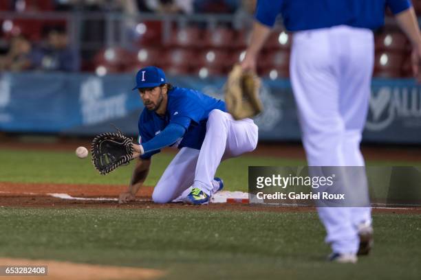 Chris Colabello of Team Italy catches the ball at first base during Game 6 of Pool D of the 2017 World Baseball Classic against Team Venezuela on...