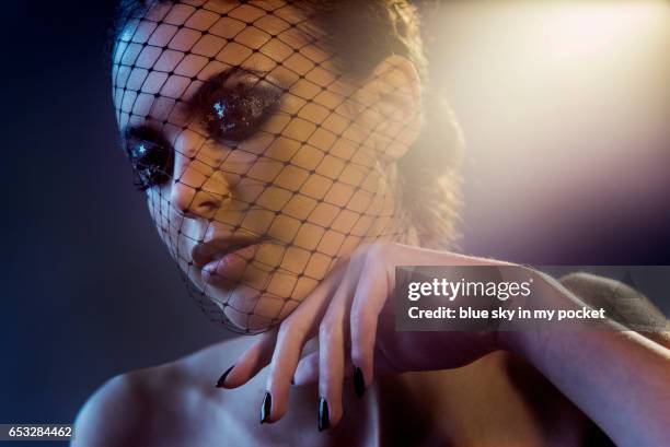 a beautiful young woman wearing a veil. - black eyeshadow stock pictures, royalty-free photos & images