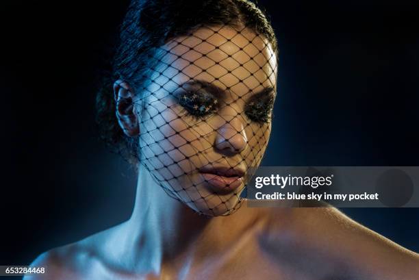 a beautiful young woman wearing a veil. - black eyeshadow stock pictures, royalty-free photos & images