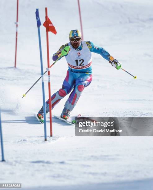 Alberto Tomba of Italy skis to a silver medal in the Slalom skiing event of the 1992 Winter Olympic Games on February 18, 1992 at Les Menuires near...