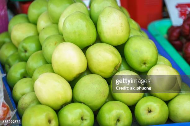 green apple - apple with bite stock pictures, royalty-free photos & images