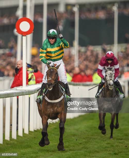 Cheltenham , United Kingdom - 14 March 2017; Noel Fehily celebrates crossing the line to win the Stan James Champion Hurdle Challenge Trophy on...