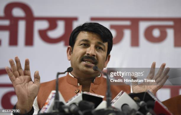 Bharatiya Janata Party's Delhi chief Manoj Tiwari, address a Press conference on the issue of MCD election in Delhi, on March 14, 2017 in New Delhi,...