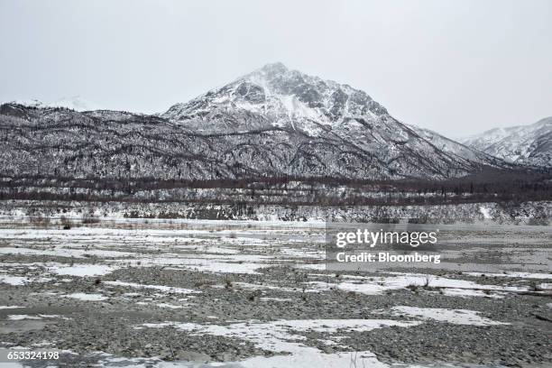 The Chugach Mountains stands near the Glenn Highway outside Anchorage, Alaska, U.S., on Tuesday, Feb. 14, 2017. Four decades after the Trans Alaska...