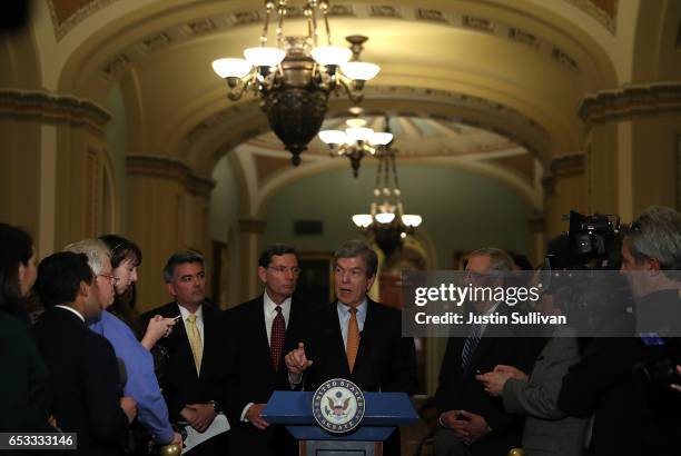 Sen. Roy Blunt speaks as Senate Majority Leader Mitch McConnell , Sen. John Barrasso and Sen. Cory Gardner look on during a news conference on...