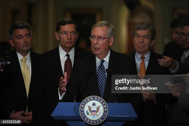 Senate Majority Leader Mitch McConnell speaks as Sen. John Barrasso and Sen. Cory Gardner Sen. Roy Blunt look on during a news conference on Capitol...