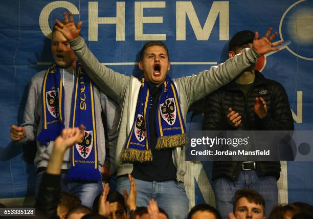 Wimbledon fans before the Sky Bet League One match between A.F.C. Wimbledon and Milton Keynes Dons at The Cherry Red Records Stadium on March 14,...