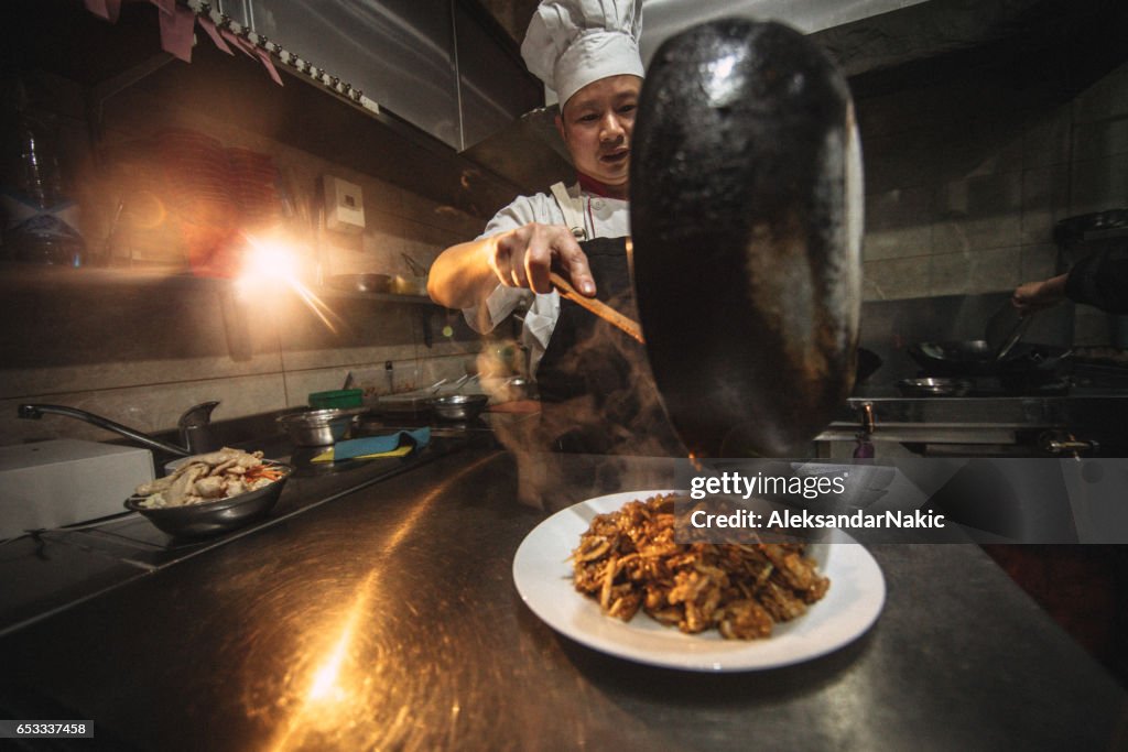 Chinese chef cooking