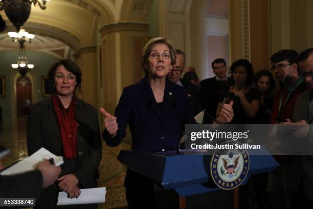 Sen. Elizabeth Warren speaks during a news conference on Capitol Hill on March 14, 2017 in Washington, DC. Republican and Democratic senators...