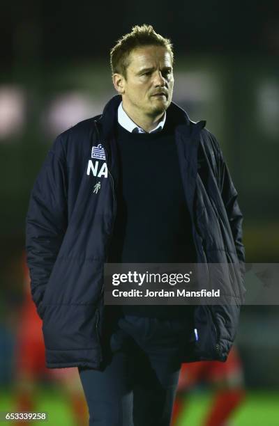 Wimbledon manager Neal Ardley walks to the dugout before the Sky Bet League One match between A.F.C. Wimbledon and Milton Keynes Dons at The Cherry...