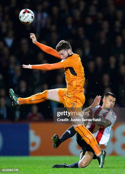 Matt Doherty of Wolves and Nico Yennaris of Brentford FC during the Sky Bet Championship match between Brentford and Wolverhampton Wanderers at...