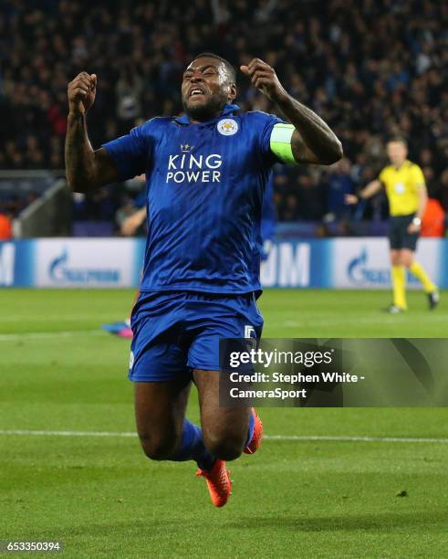 Leicester City's Wes Morgan celebrates scoring his sides first goal LEICESTER, ENGLAND during the UEFA Champions League Round of 16 second leg match...