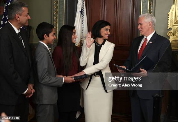 Seema Verma participates in a swearing-in ceremony, officiated by U.S. Vice President Mike Pence , as her husband Sanjay , daughter Maya and son...