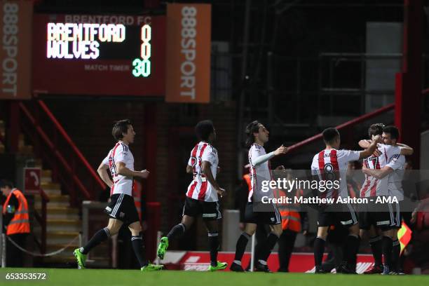 Maxime Colin of Brentford celebrates after scoring a goal to make it 1-0 during the Sky Bet Championship match between Brentford and Wolverhampton...