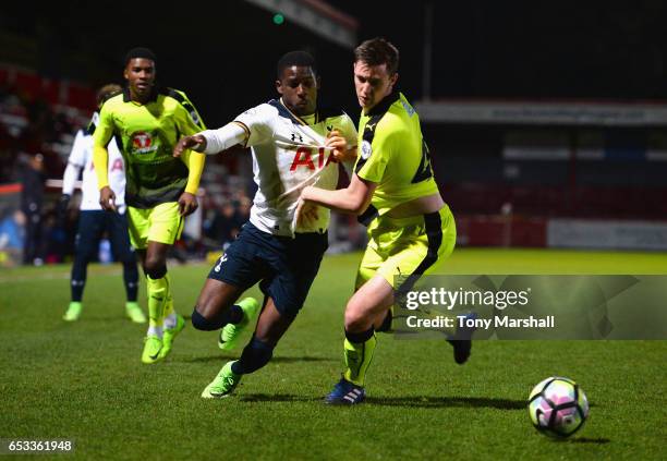 Shilow Tracey of Tottenham Hotspur battles for the ball with Dominic Hyam of Reading during the Premier League 2 match between Tottenham Hotspur and...