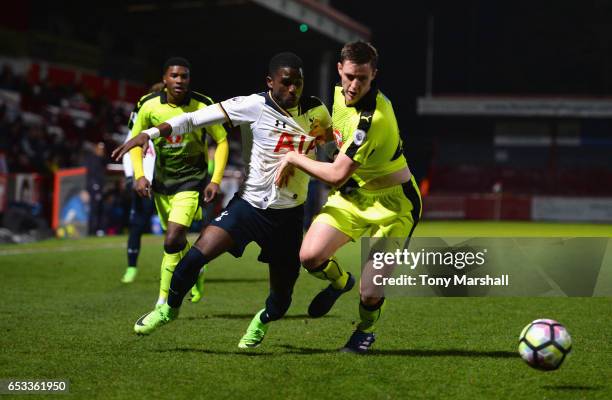 Shilow Tracey of Tottenham Hotspur battles for the ball with Dominic Hyam of Reading during the Premier League 2 match between Tottenham Hotspur and...