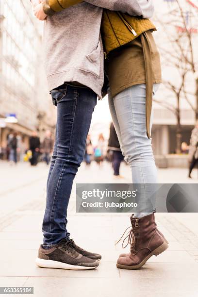 urban love, couple kissing - kissing feet stock pictures, royalty-free photos & images