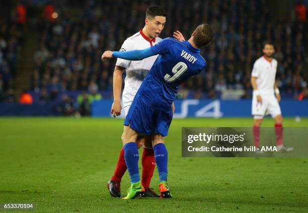 Samir Nasri of Sevilla and Jamie Vardy of Leicester City butt heads during the UEFA Champions League Round of 16 second leg match between Leicester...