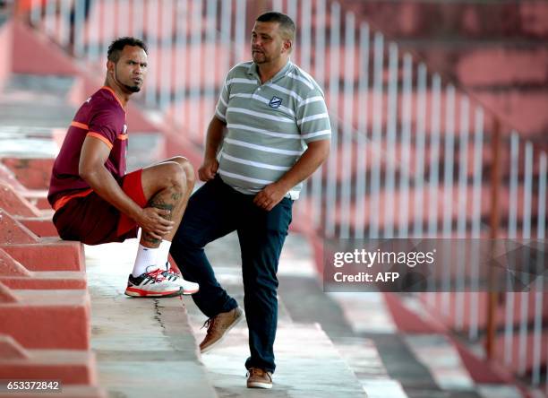 Bruno Fernandes former goalkeeper of Atletico MG and Flamengo, and his manager Lucio Mauro, are pictured during Bruno's presentation as the new BOA...