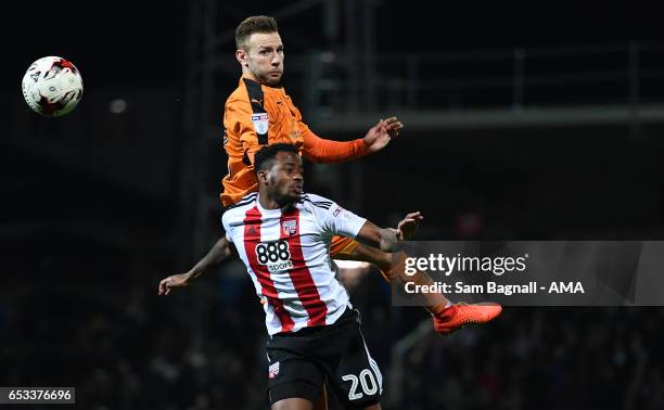 Josh Clarke of Brentford and Andy Weimann of Wolverhampton Wanderers during the Sky Bet Championship match between Brentford and Wolverhampton...