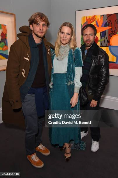Christopher De Vos, Alice Naylor-Leyland and Peter Pilotto attend the launch of new book "London Uprising: Fifty Fashion Designers, One City" by...