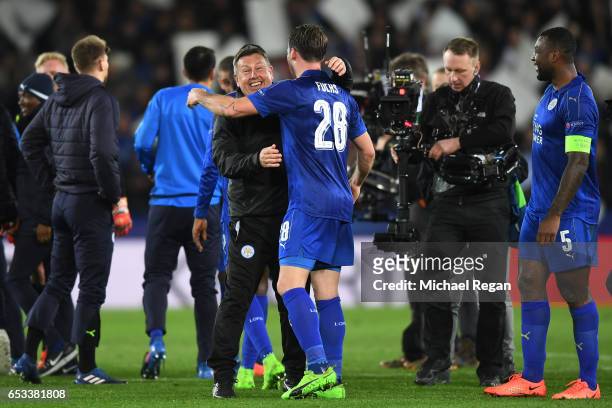 Craig Shakespeare the interim Manager of Leicester City and Christian Fuchs of Leicester City celebrate their team's 3-2 agg victory following the...