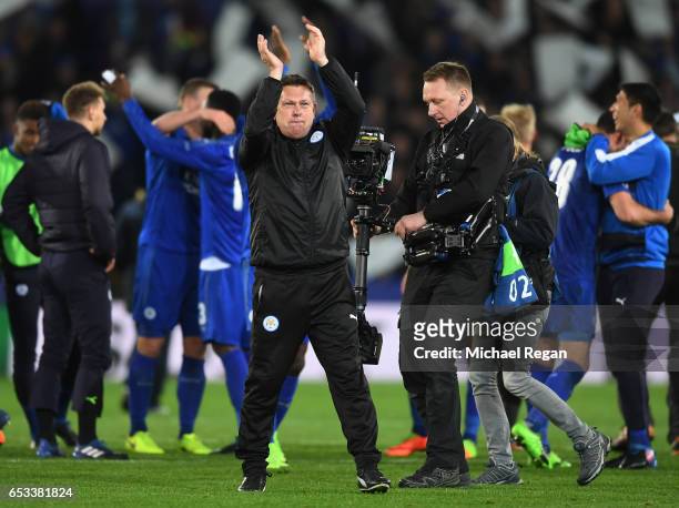 Craig Shakespeare the interim Manager of Leicester City celebrates his team's 3-2 agg victory following the final whistle during the UEFA Champions...