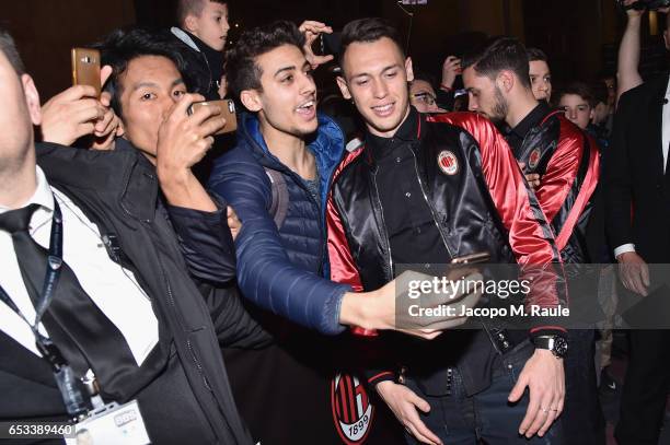 Lucas Ocampos takes selfies with fans during The New Bomber Presentation at the Diesel Store on March 14, 2017 in Milan, Italy.