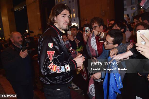 Alessio Romagnoli signs autographs during The New Bomber Presentation at the Diesel Store on March 14, 2017 in Milan, Italy.