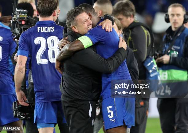 Leicester City's goal scorer and captain defender Wes Morgan celebrates with Leicester CityÕs head coach Craig Shakespeare after the final whistle...