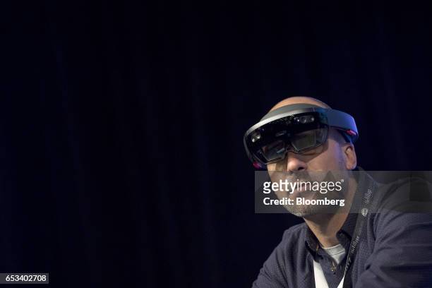 Facundo Diaz, co-founder and chief executive officer of Vrtify Inc., wears a pair of Microsoft Corp, HoloLens glasses as he speaks at the 2017 South...