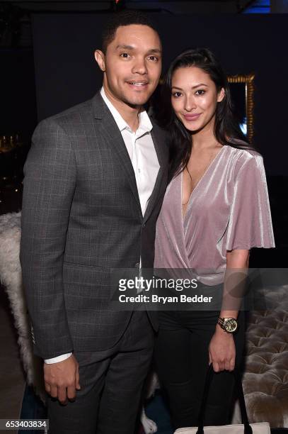 Trevor Noah and Jordyn Taylor attend Experience Harlem hosted by Airbnb and Ghetto Gastro on March 14, 2017 in New York City.