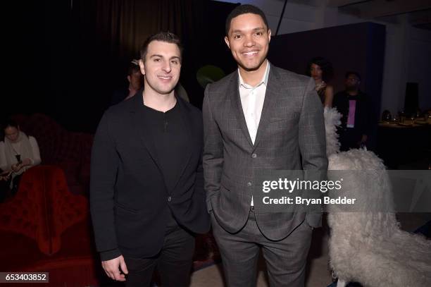 Airbnb CEO Brian Chesky and Trevor Noah attend Experience Harlem hosted by Airbnb and Ghetto Gastro on March 14, 2017 in New York City.