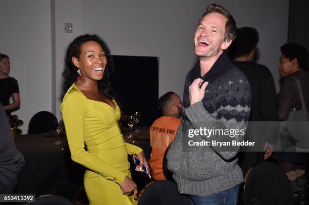 Teri Johnson and Neil Patrick Harris attend Experience Harlem hosted by Airbnb and Ghetto Gastro on March 14, 2017 in New York City.