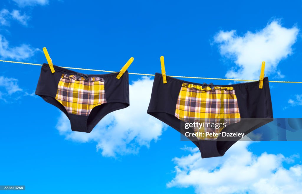 Washing Line With Small And Obese Knickers High-Res Stock Photo - Getty  Images