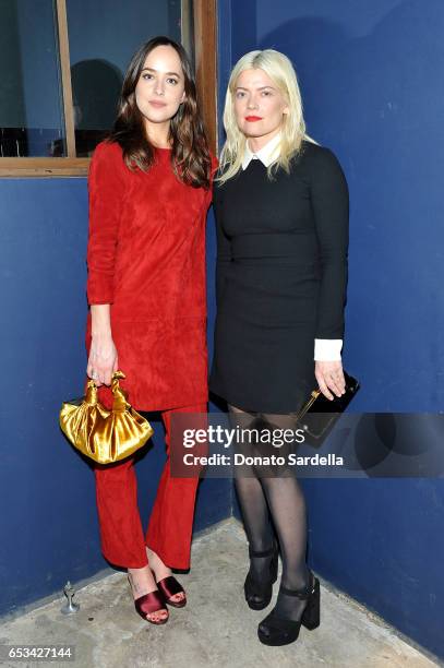 Dakota Johnson and Kate Young at the Power Stylists Dinner, hosted by The Hollywood Reporter and Jimmy Choo, on March 14, 2017 in West Hollywood,...