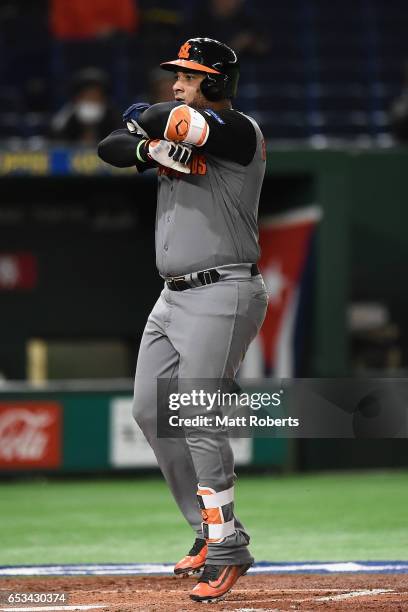 Outfielder Wladimir Balentien of the Netherlands celebrates after hitting a solo homer in the top of the third inning during the World Baseball...