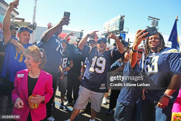 Tackle Chris Hairston and guard Donavon Clark interact with fans at the unveiling of the "Chargers Chilli Cheese" at Pink's Hot Dogs on March 14,...