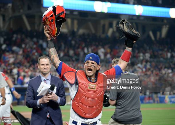 Yadier Molina of Puerto Rico celebrates after Puerto Rico beat the Dominican Republic 3-1 in the World Baseball Classic Pool F Game One at PETCO Park...