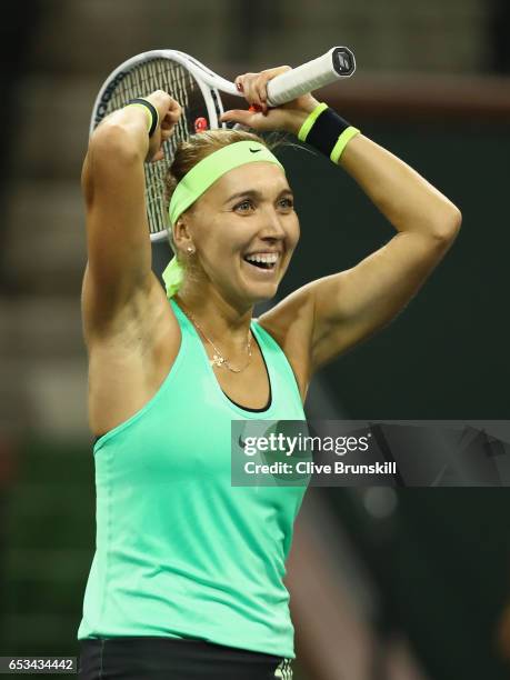 Elena Vesnina of Russia celebrates match point against Angelique Kerber of Germany in their fourth round match during day nine of the BNP Paribas...