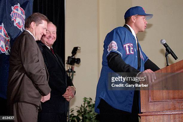 Alex Rodriguez talks during a press conference after being signed to the Texas Rangers at The Ball Park in Arlington, Texas.Mandatory Credit: Gary...